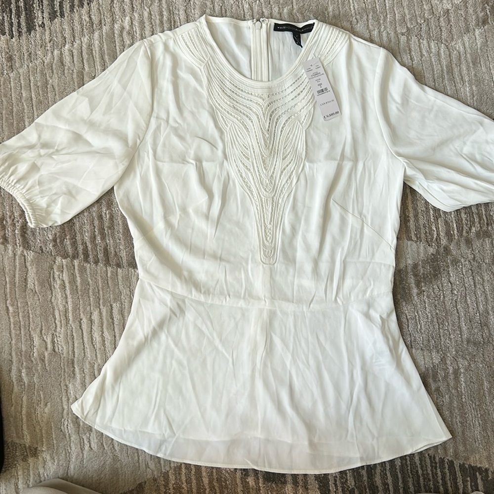 Elegant NWT cream blouse
